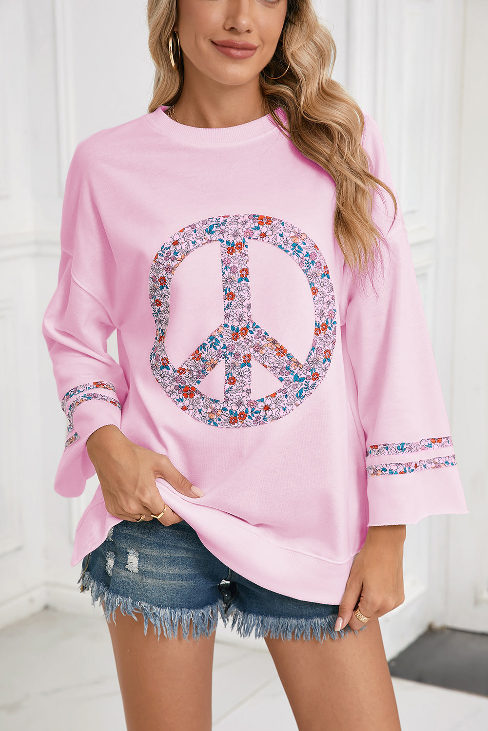 Jet Stream Floral Peace Sign Drop Shoulder Top